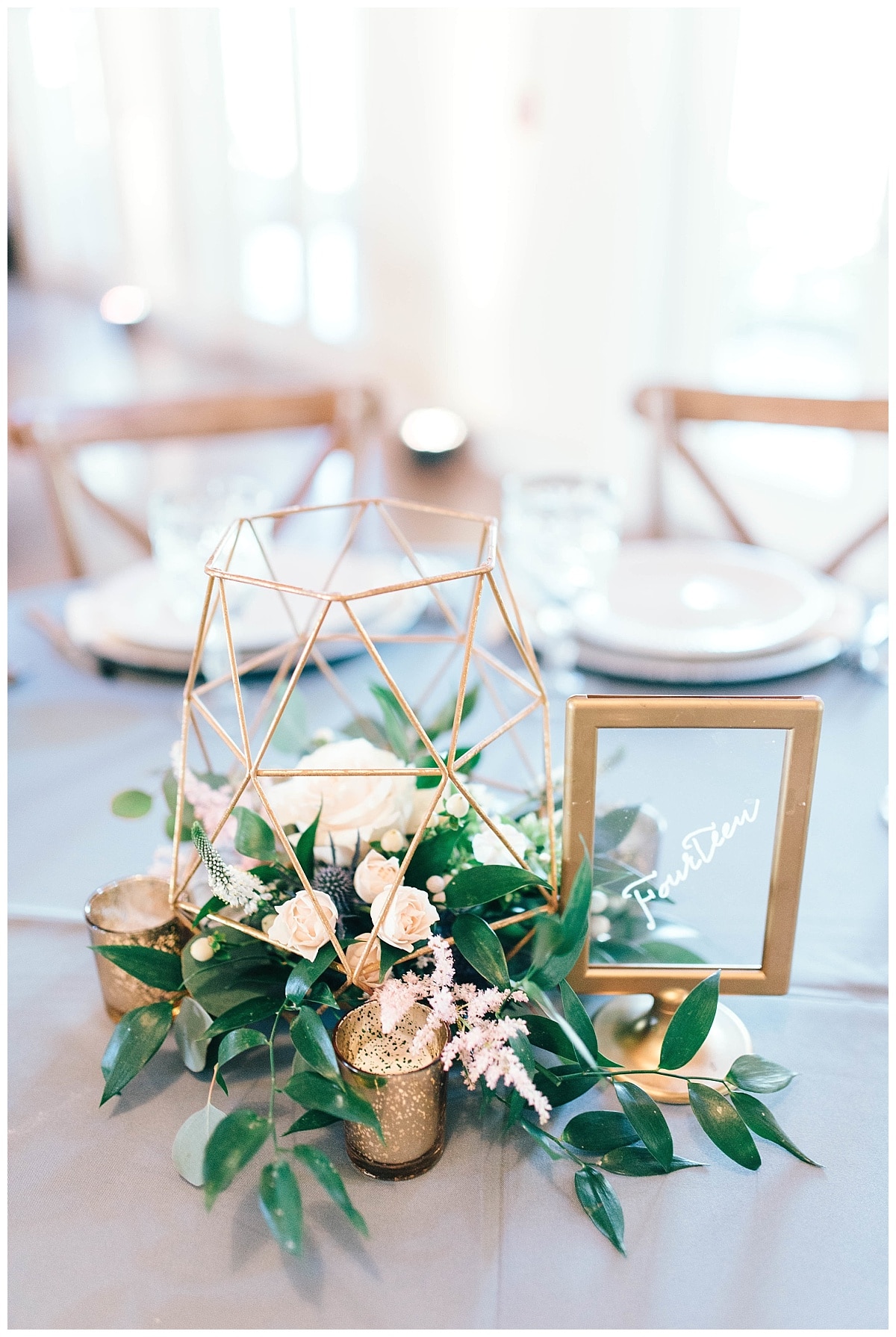 The boathouse reception design was rustic and charming with touches of gold