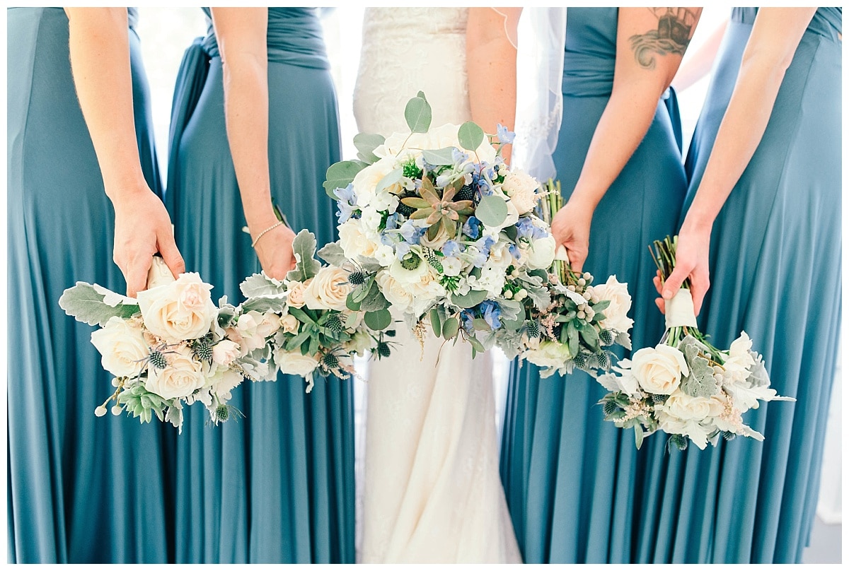 Michelle and Derek's wedding theme included soft blues, dark cyan, and elegant ivory hues