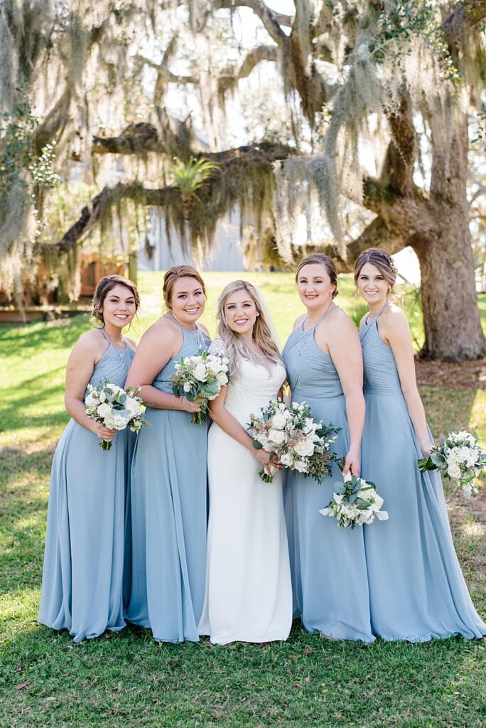 Brevard county bride at up the creek farms with periwinkle blue bridesmaids