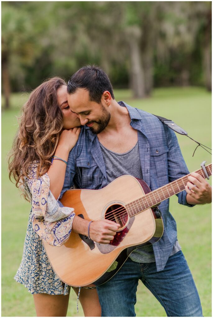 Fred serenading Samantha for their romantic proposal at up the creek farms