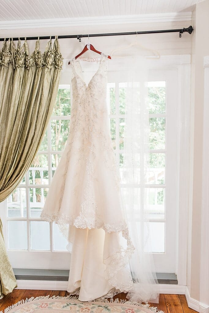 Wedding dress with custom hanger from Patricia South Bridal