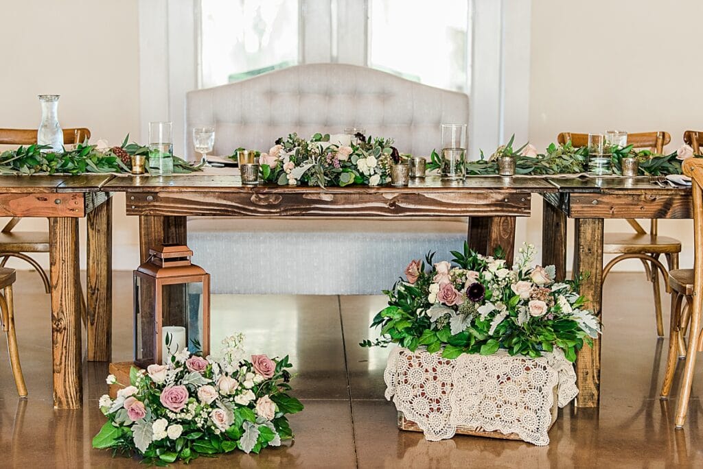 rustic elegant sweetheart farmtable with lace accents and textural florals