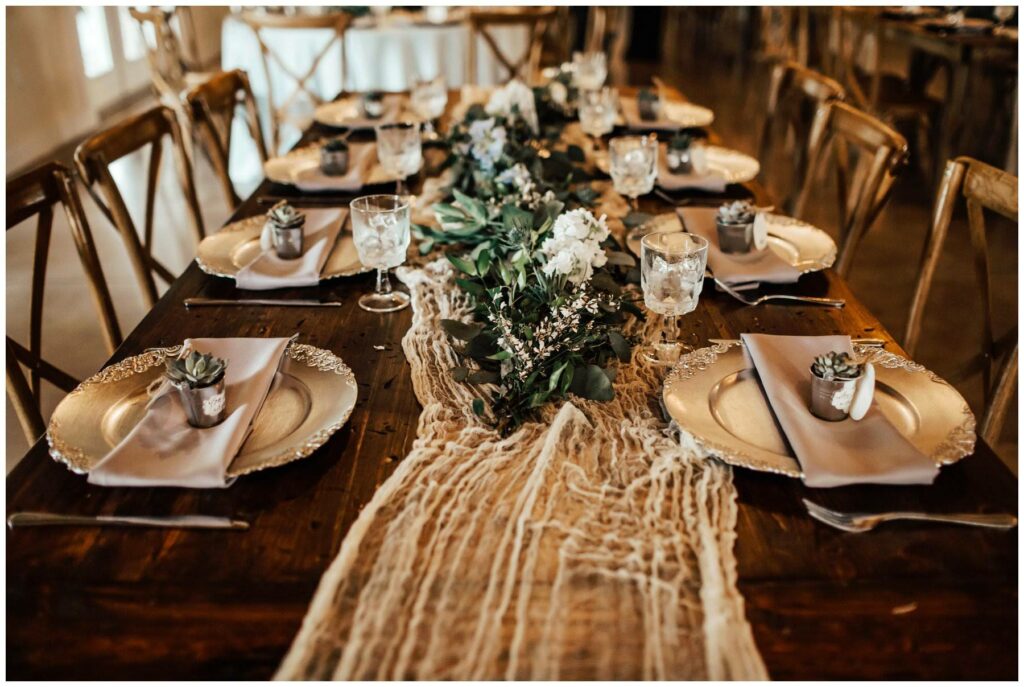 Rustic bohemian farmhouse tablescapes with succulent party favors at up the creek farms