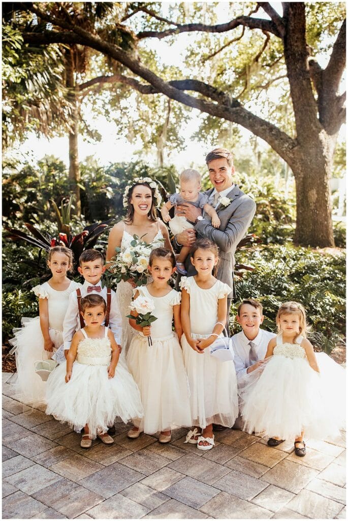 Adorable flower girl and ring bearer squad at up the creek farms wedding ceremony