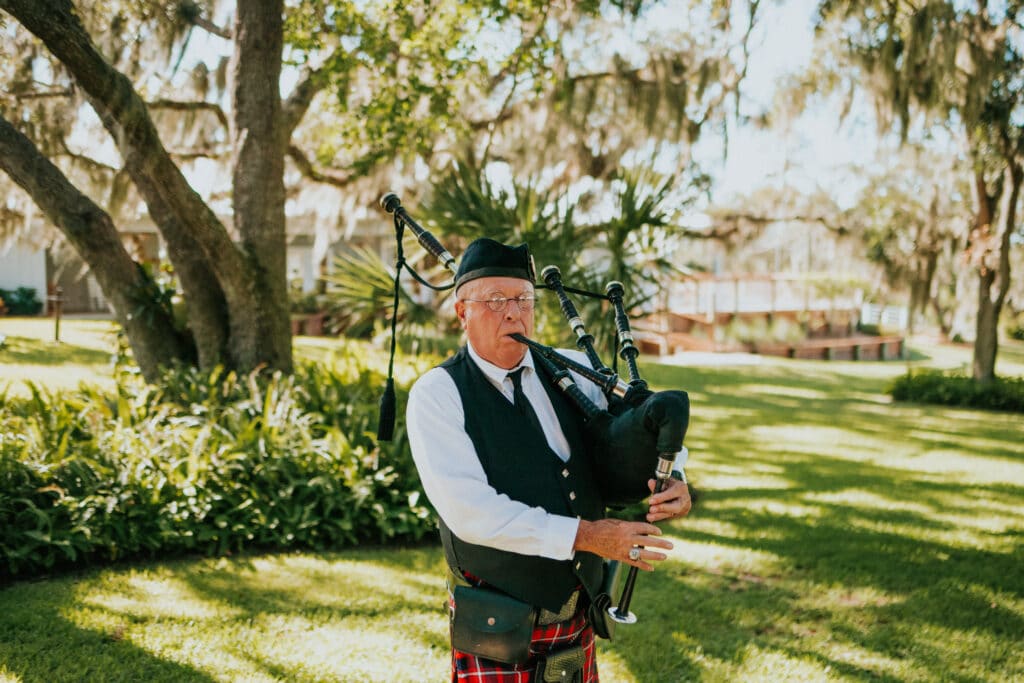 A Treasure Coast Bag Piper plays the ceremony prelude at up the creek farms and the guests loved it.