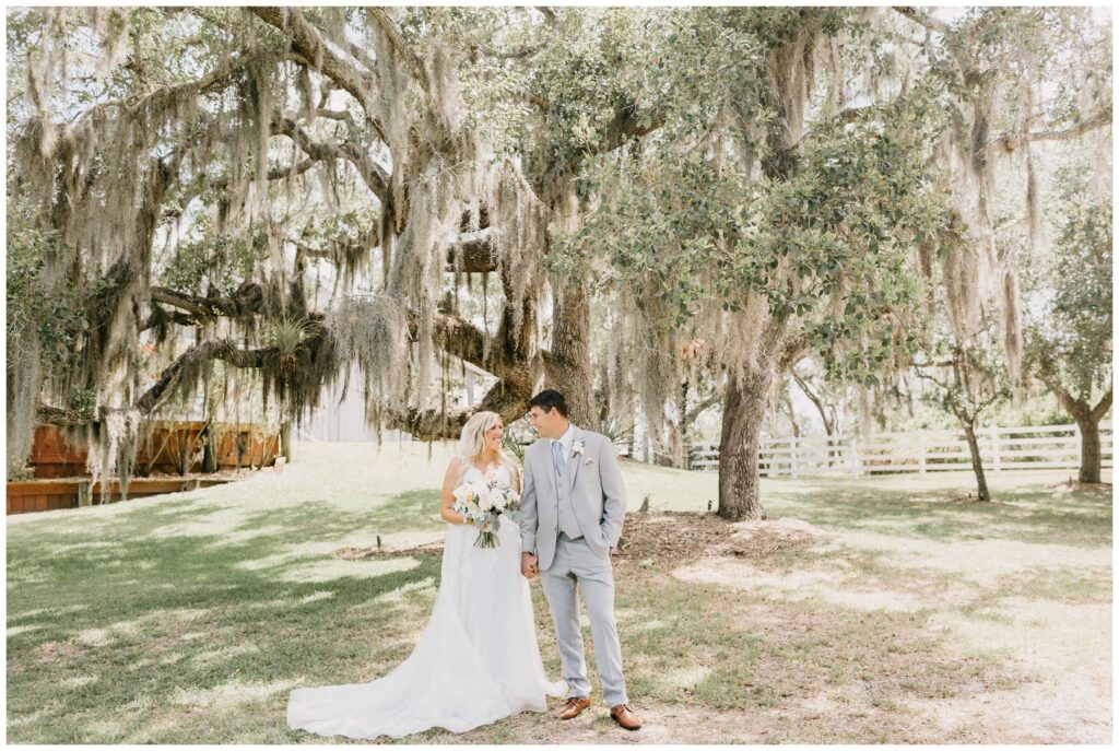 whimsical southern wedding at up the creek farms in valkaria florida