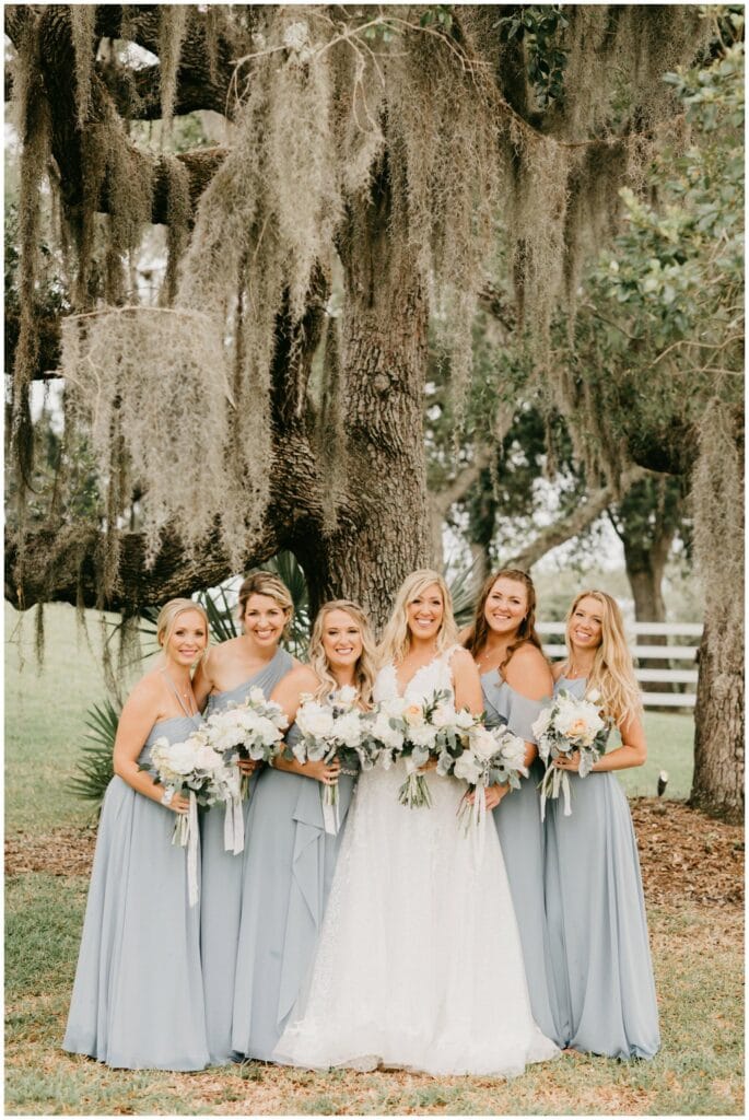 Brevard County bride and bridesmaids with pale green dresses at up the creek farms