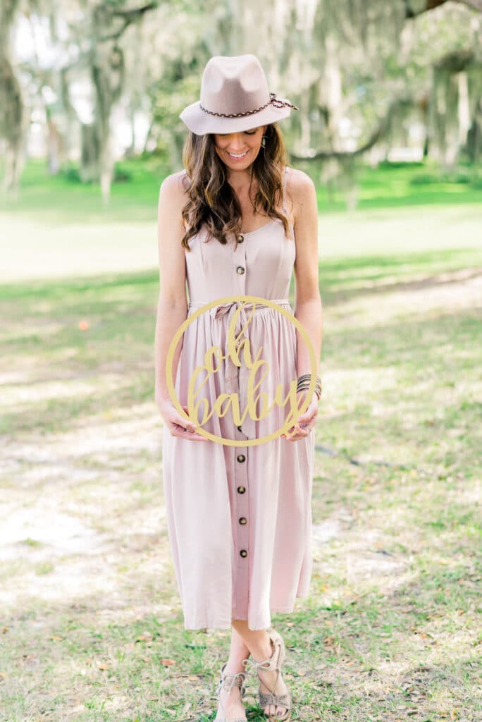 Oh Baby gold announcement sign for maternity shoot at up the creek farms