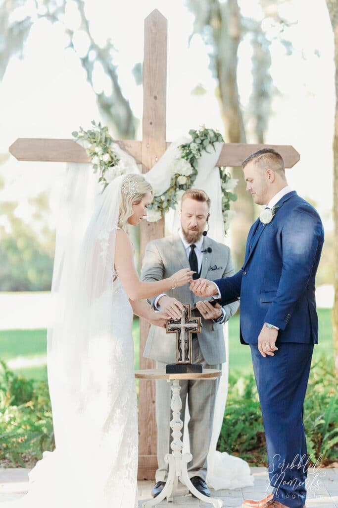 Wooden cross and religious wedding ceremony at up the creek farms 