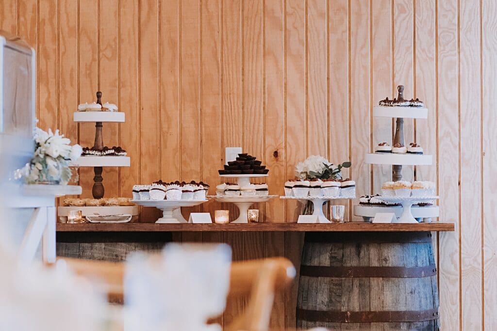 wedding cupcake dessert display table at up the creek farms