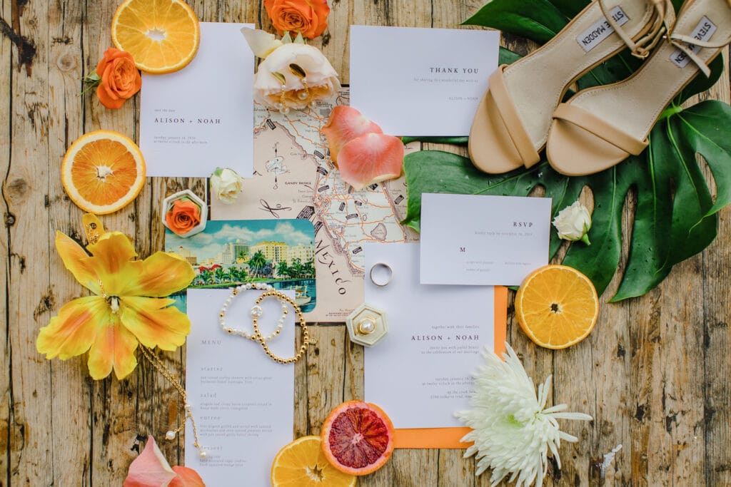 Florida inspired wedding stationery with sliced orange accents