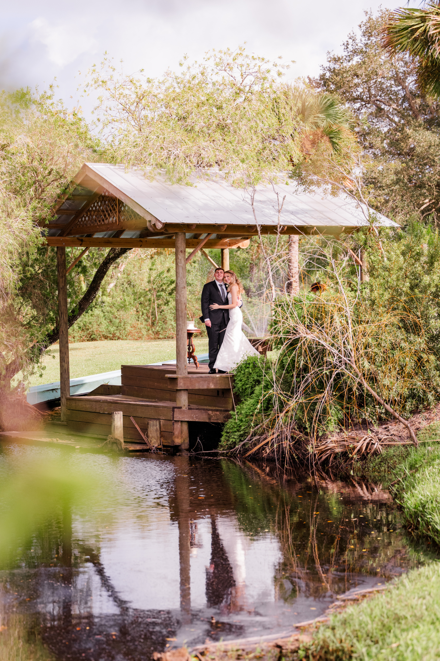 Trees flanking dockside ceremony venue